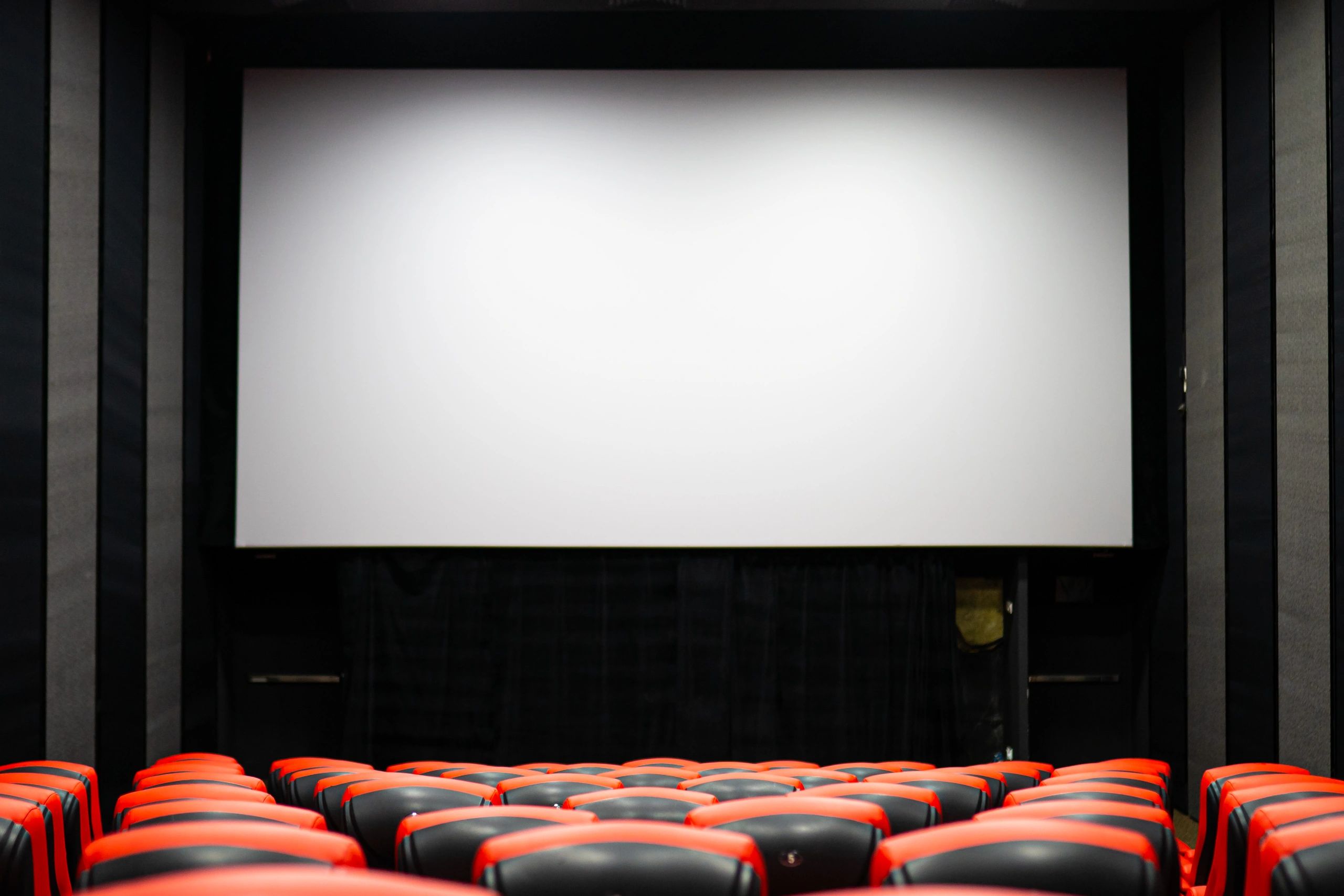 Empty cinema hall with dramatic seating