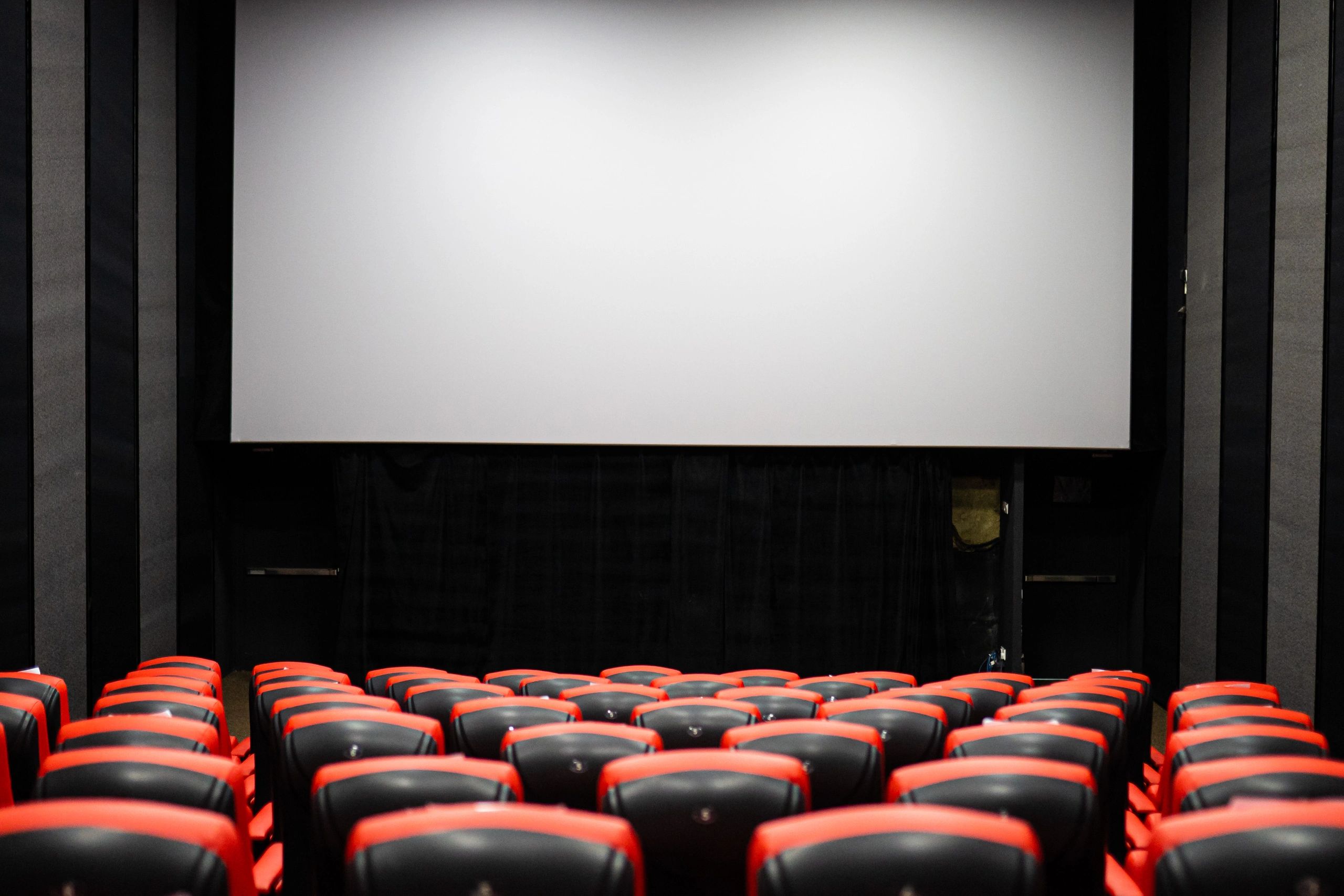 Cinema hall interior with rows of seats