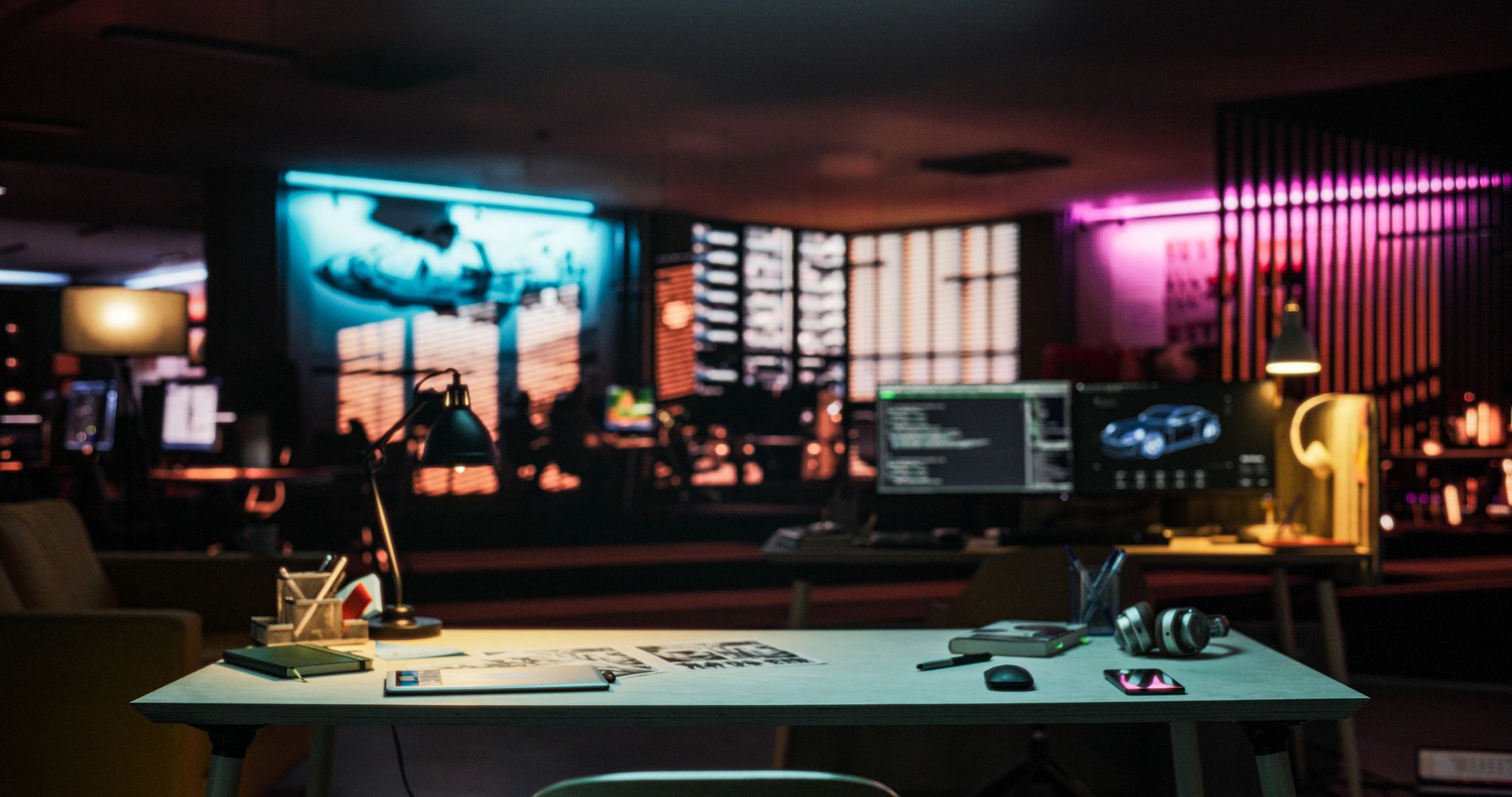 Dark modern media workspace with screens