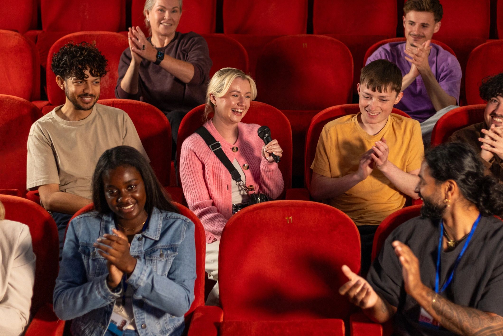 Audience seated in an auditorium during a live event