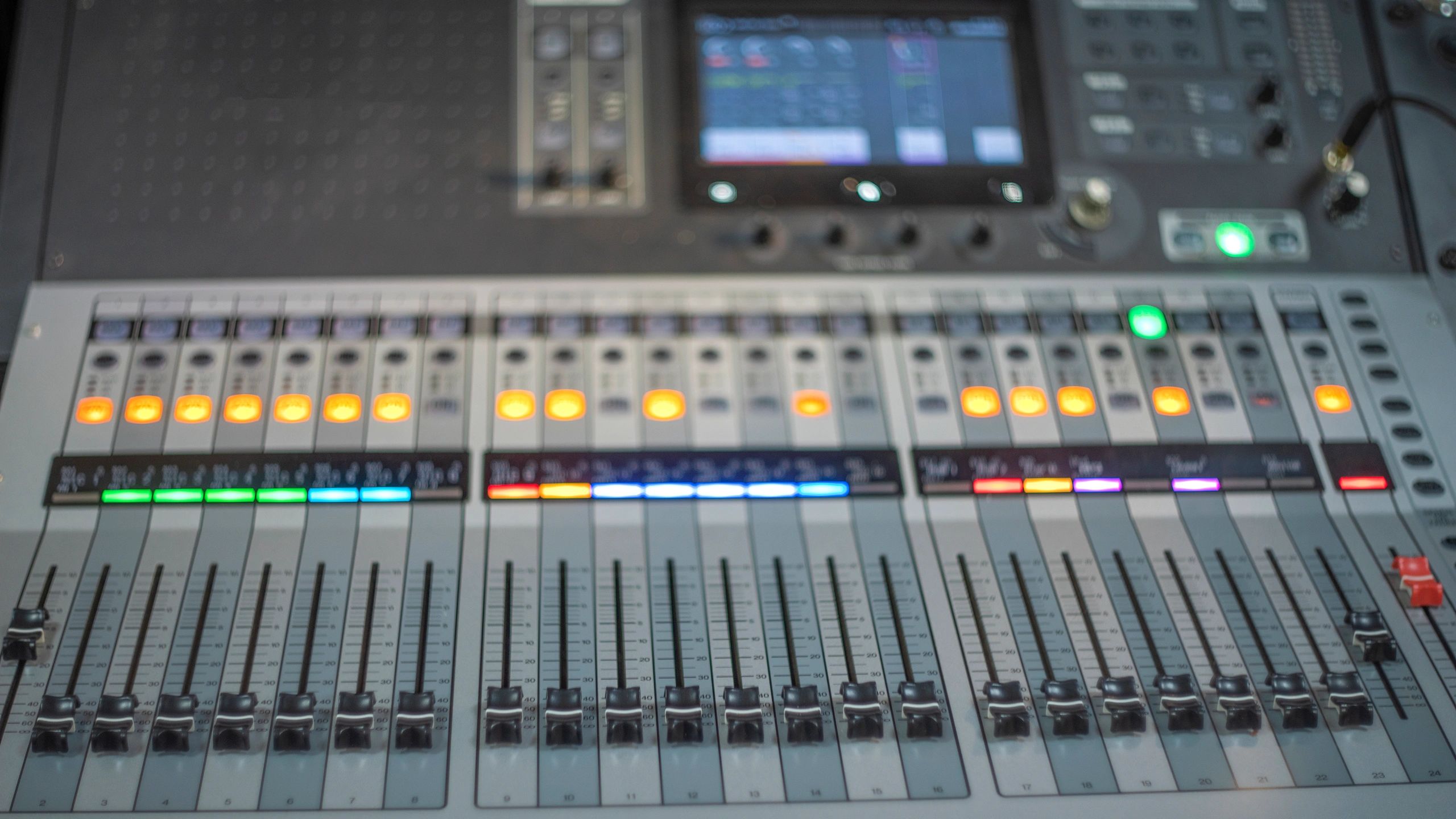 Professional digital mixing console in a studio environment